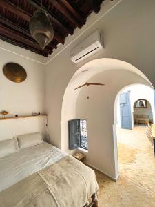 Rúm í herbergi á Riad l'Echappée, en exclusivité, 5 chambres