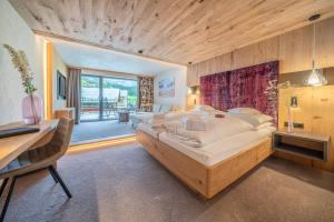 Postel nebo postele na pokoji v ubytování Hotel Wiesental