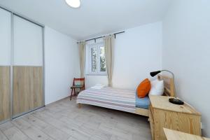 Postel nebo postele na pokoji v ubytování Horizonte apartman