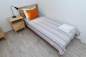 Postel nebo postele na pokoji v ubytování Horizonte apartman