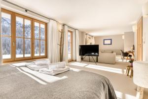 Televízia a/alebo spoločenská miestnosť v ubytovaní Chalet Lilly - Luxury by A-Appartments mit Ski in - Ski out