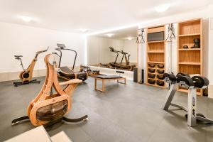 Posilňovňa alebo fitness centrum v ubytovaní Chalet Lilly - Luxury by A-Appartments mit Ski in - Ski out