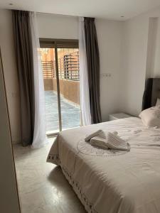 Postel nebo postele na pokoji v ubytování 1Bed Apartment - Sleeps 4 - Balcony Wifi Parking