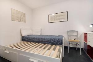 Katil atau katil-katil dalam bilik di San Giorgio
