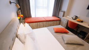Postel nebo postele na pokoji v ubytování Time Hotel