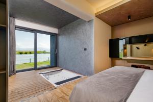 Postel nebo postele na pokoji v ubytování Serenity Resort