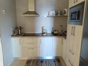 A kitchen or kitchenette at La Casita de Brownie