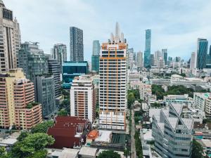 an aerial view of a city with tall buildings at Bandara Suites Silom, Bangkok in Bangkok