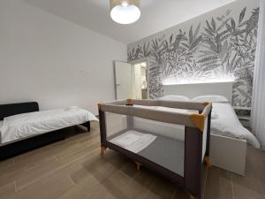 a bedroom with two bunk beds and a mirror at Comfort Zone in Mestre