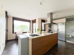 a kitchen with a sink and a counter top at CASA VISTA SIERRA in Jaraiz de la Vera