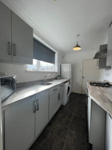 Kjøkken eller kjøkkenkrok på Alexander Apartments West Harton