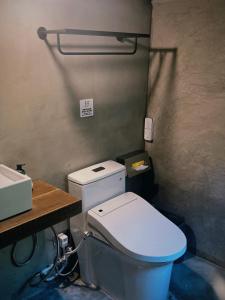 Un baño de Yu Apartment
