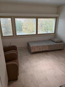 Et sittehjørne på Pet-friendly 4 Bed Apt in Turku with Park views