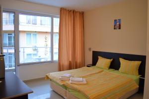 Postel nebo postele na pokoji v ubytování Hotel Paradise