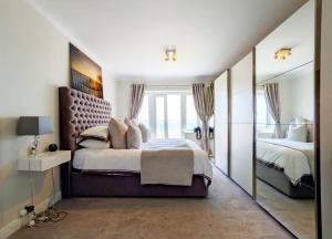 Postel nebo postele na pokoji v ubytování Beach View