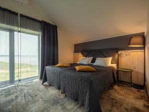 Postel nebo postele na pokoji v ubytování Tulivee Villa