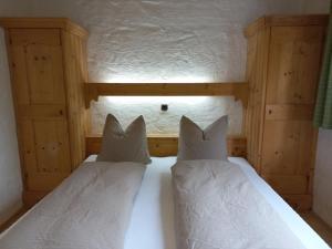 Rúm í herbergi á Scheffauerhof