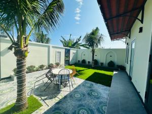 Billede fra billedgalleriet på Villa Ngọc Châu Phan Thiết Chi nhánh 2 - 4 Phòng Ngủ, Có Bếp, Phòng Ăn, Phòng Khách, Miễn Phí Sân BBQ và Bãi Xe Ô Tô Rộng Rãi i Phan Thiet