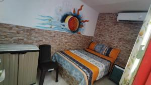 Postel nebo postele na pokoji v ubytování San Andrés Vive Paradise Habitaciones con baño privado a 80mts de la playa principal
