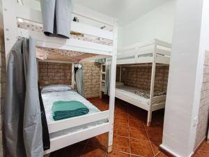 a bedroom with two bunk beds in a room at Daydream Medano Coliving in El Médano