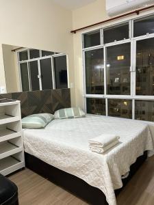 Llit o llits en una habitació de COPACABANA RIO PRAIA 15