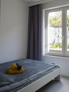 Posteľ alebo postele v izbe v ubytovaní Apartament Smart Kamienica Grochów with free parking