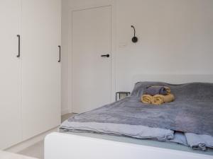 Posteľ alebo postele v izbe v ubytovaní Apartament Smart Kamienica Grochów with free parking