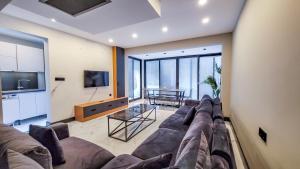 Televisyen dan/atau pusat hiburan di Çimentepe Residence Deluxe 3 - Superior Duplex Villa in Yalikavak