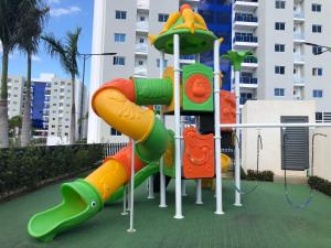 a playground with a slide in a city at Tranquil Oasis In El Retiro St in Santiago de los Caballeros