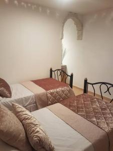 Voodi või voodid majutusasutuse Relaxed garden apartment with Galilee sea view 1 toas