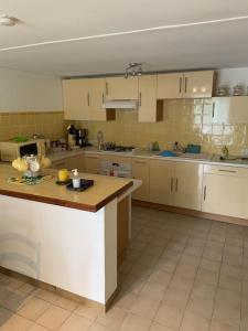 Kuchyň nebo kuchyňský kout v ubytování Maisonnette 1 chb à la campagne + 6 fotografií