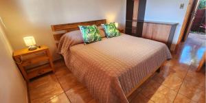 מיטה או מיטות בחדר ב-Cabañas Tupuna Lodge