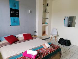 Posezení v ubytování Jolie chambre climatisée avec balcon chez l'habitant