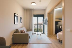 Posezení v ubytování Palau Suites & Apartments