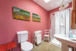 a bathroom with a toilet and a sink at Lodge Farm in Freston