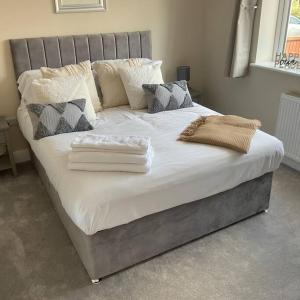 Katil atau katil-katil dalam bilik di Beautiful Cottage in Ashbourne