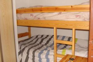 Postel nebo postele na pokoji v ubytování Studio Cabine Ax Les 3 Domaines