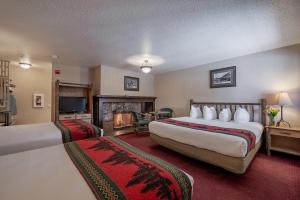 Postel nebo postele na pokoji v ubytování Antler Inn + 34 fotografií