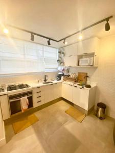 Фотография из галереи Duplex moderno 2 quartos na praia Leblon в Рио-де-Жанейро +7 фотографий