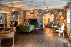 Demeures & Châteaux - Hôtel de la porte Saint-Malo - DINAN的休息区