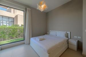 Letto o letti in una camera di Elegant 4BR in Tawila, Gouna. Private Pool, Lagoon