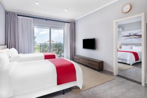 Postel nebo postele na pokoji v ubytování Ramada by Wyndham St Kitts Resort