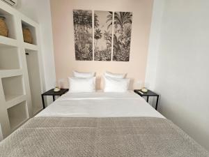 Postel nebo postele na pokoji v ubytování Riad Coconut