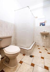 Kylpyhuone majoituspaikassa Hotel Santa Lucia - Oficial