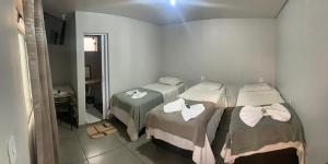 Кровать или кровати в номере Hotel GranDourados