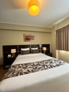Postel nebo postele na pokoji v ubytování Hotel El Tambo 2