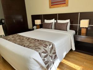 Postel nebo postele na pokoji v ubytování Hotel El Tambo 2