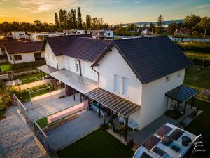an overhead view of a house with a deck at Komfort Home Bursport Bt. ház in Balatonfenyves