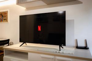 TV a/nebo společenská místnost v ubytování Casa Quarto di Luna