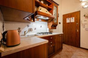 Kuchyň nebo kuchyňský kout v ubytování Casa Quarto di Luna